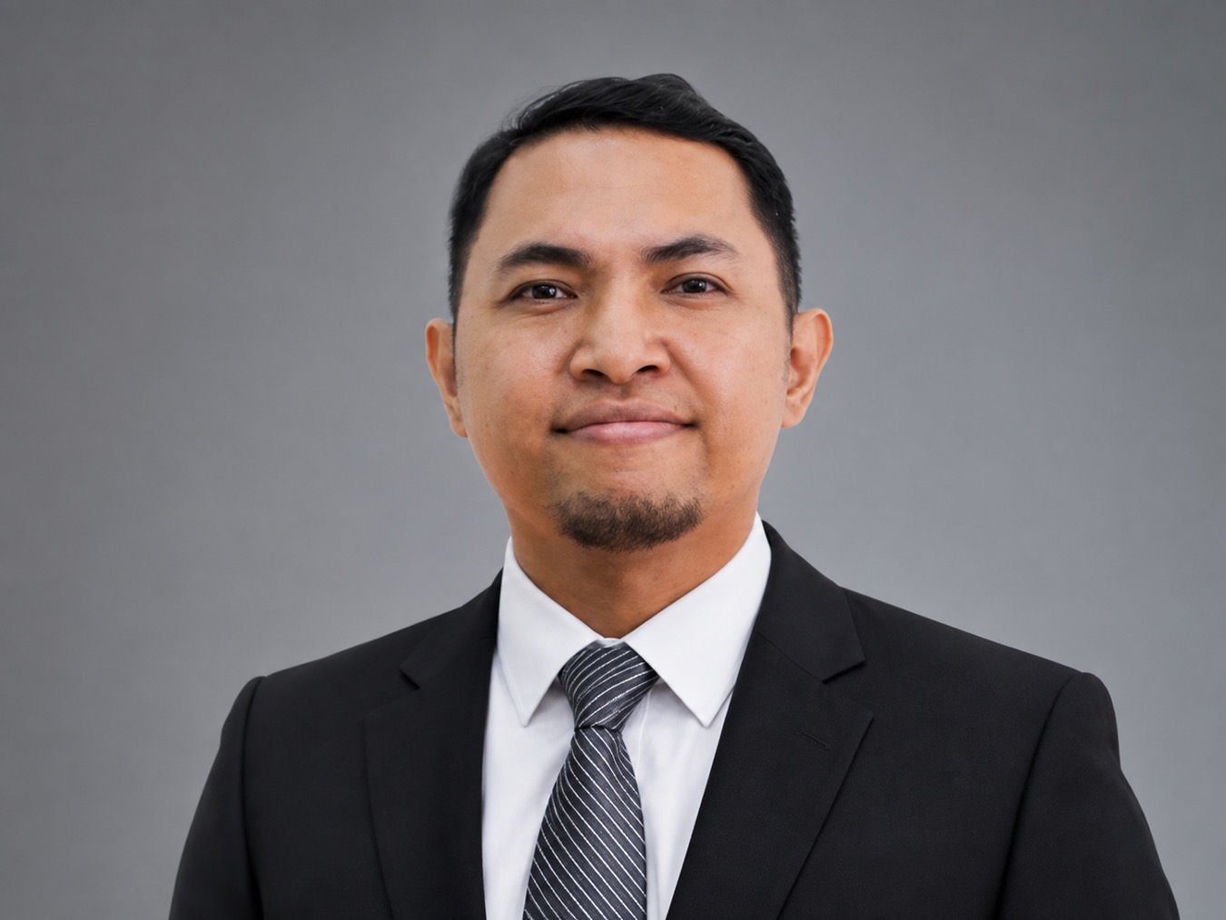 Dr. Alim Syariati, M.Si.