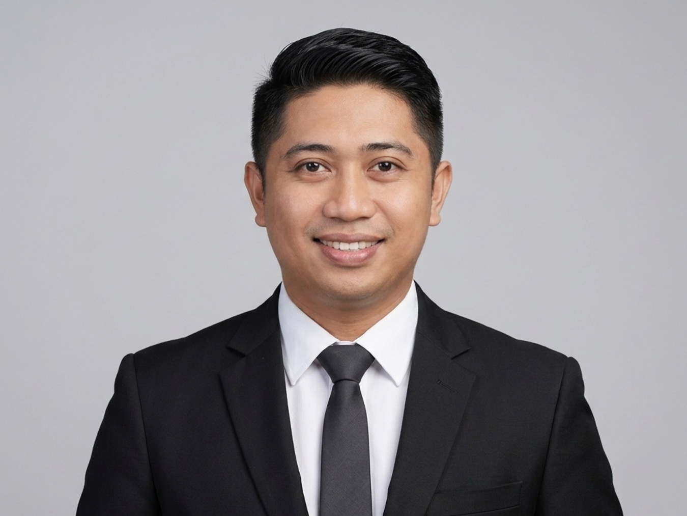 Dr. Ilham, M.M.